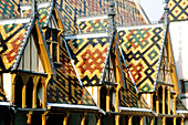 Ceramic tiles roof of Hotel Dieu (1443). Beaune. Burgundy. France