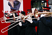 The Salvation Army band passing by ad. London. England