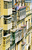 Typical bow windows on Grand Harbour side. View from Upper Barraca. Valletta. Malta.