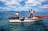 Fisherman returning from fishing. La digue Island. Seychelles