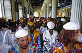 Sunday mass in Sainte-Marie with ladies dressed in traditional attire. Martinique, Caribbean, France