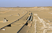 Railroad in the desert near Dahkla oasis. Lybian desert, Egypt