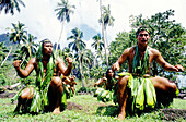Local men and women performing the traditional Pig Dance in Hatiheu. Nuku-Hiva island. Marquesas archipelago. French Polynesia