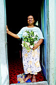 Mrs. Apolline, local resident by her house door. Fatu-Hiva island. Marquesas archipelago. French Polynesia (MR)