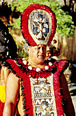 Man playing the character of an ancient Great priest in Tiki Village local weddings. Moorea island in the Windward islands. Society archipelago. French Polynesia (model released)