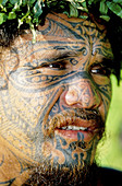 The tattoed tattoer. Tahiti island in the Windward islands. Society archipelago. French Polynesia (model released)
