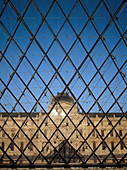 View from inside of the Louvre glass pyramid by architect Ieoh Ming Pei. Paris. France