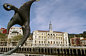 Sculpture by Vicente Vázquez Canónico, City Hall in background. Muelle de Uribitarte. Bilbao. Spain