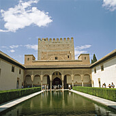 Patio de los Arrayanes (Court of the Myrtles) and Torre de Comares, Alhambra. Granada. Andalusia, Spain