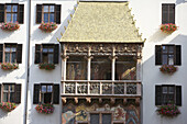 The Golden Roof , late Gothic oriel constructed for Emperor Maximilian I to serve as a royal box where he could sit in luxury and enjoy tournaments in the square below (c. 1500), old town, Innsbruck. Tyrol, Austria