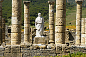 Trajan statue at ruins of forum, old roman city of Baelo Claudia (II BC). Tarifa. Cadiz province. Spain