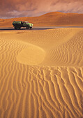 Highway crossing desert. Morocco