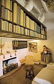 Bookshelves and fireplace in Salvador Dalí s house and museum, Portlligat. Girona province, Catalonia, Spain