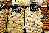 Different kinds of mushrooms. Oyster mushrooms and champignons. Mercado de la Boquería. Barcelona. Spain