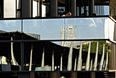 Reflections of Maremagnum with Arts hotel at the back. Barcelona. Catalonia. Spain.