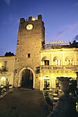 Italy. Sicily. Taormina. City gate and clock tower, Porta di Mezzo, at Piazza IX Aprile.
