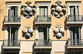 Spain. Barcelona. Casa Bruno Quadros on Las Ramblas, decorated with umbrellas.
