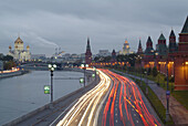 Moscow, Russia, Kremlevskaya Nab, Kremlin Walls, Neva River, at twilight, with traffic, rush hour, car light streaks.