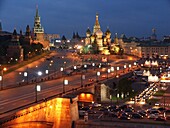 Moscow, Russia, Kremlevskaya Nab, Kremlin Walls, Neva River, at twilight, with traffic, rush hour, car light streaks.