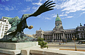 Condor in the monument A los Dos Congresos. Congress Building at the rear. Buenos Aires. Argentina.