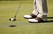 Feet. Golf.