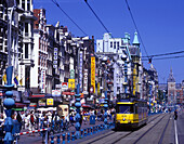 Street scene, trams, Dam rak, Amsterdam, holland.