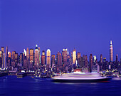 Cruise ship, Mid-town skyline, Manhattan, New York, USA.