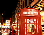 Red telephone boxes, Denman street, Soho, London, England, U.K.
