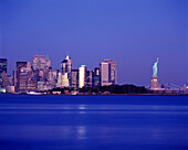 Statue of liberty & downtown skyline, Manhattan, New York, USA.