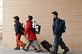 Schoolboys Carrying Their School Bags