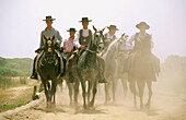 During Pentecost some pilgrims cover on horseback a three days journey through Doñana National Park to El Rocío. Huelva province. Andalusia. Spain