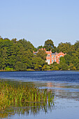 Augstkalnes, school building and lake