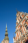 House of the Blackheads guild and church tower of Saint Peters church, Riga, Latvia