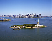 Statue of liberty & downtown skyline, Manhattan, New York, USA