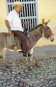 Man with donkey. Trinidad, Cuba.