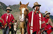 Men with traditional dress. Urubamba River valley, Peru
