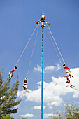 Voladores (flyers) perform Totonac Native ritual outside of Tulum. Yucatan, Mexico