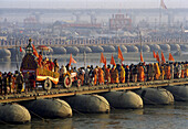 Pilgrims crossing the Ganges at Kumbh Mela Festival. Allahabad, Uttar Pradesh, India