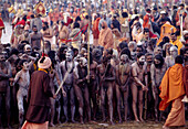 Procession of naked pilgrims going for a holy bath in Ganges River during Khumb Mela Festival (2001), Allahabad. Uttar Pradesh, India