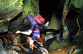 A man canyoning in Hole in the Wall Canyon, Blue Mountains National Park, New South Wales, Australia