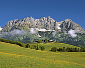 Mountain Wilder Kaiser with farm house in the Tyrol country in the Austrian Alps