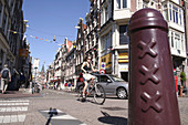 Shopping street Haarlemmerstraat/Singel in Amsterdam, Holland, Netherlands