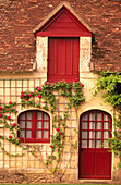 Rose cottage doorway. Chenonceaux Castle. Loire Valley. France
