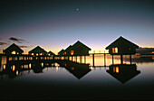 Le Meridien Hotel bungalows at sunset. Tahiti. French Poynesia
