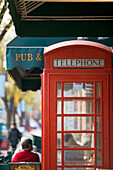 English telephone booth at Whyte Avenue, Old Strathcona area. Edmonton. Alberta, Canada