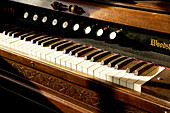 Antique organ, Fort Calgary Historic Park. Calgary. Alberta, Canada