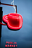 Neon coffee cup sign at evening, Pike Place Market. Seattle. Washington, USA