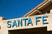 Sign at Santa Fe train station in downtown Santa Fe. New Mexico, USA