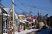 Town view with town church in winter. St. Sauveur des Monts. The Laurentians. Quebec. Canada.