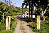 Grenada, West Coast, Gouyave: Dougaldston Estate, Cocoa sorting station. Estate Entrance